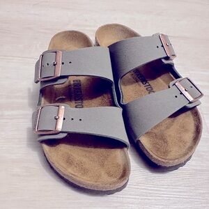 Birkenstock Arizona sandals in olive green.